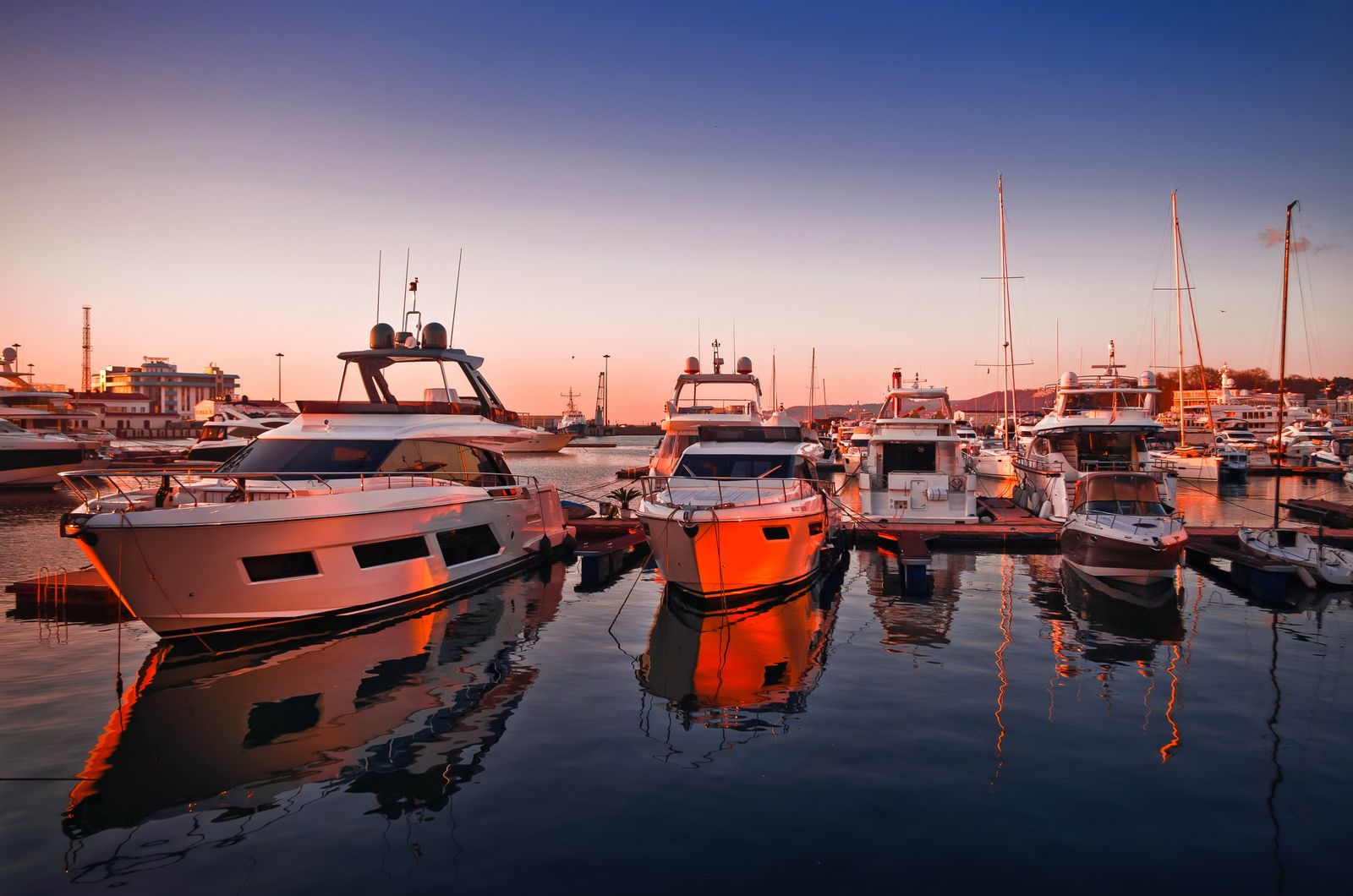 Harbor with vessels at sunset